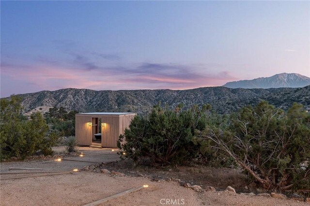 48575 Paradise Ave, Morongo Valley, CA 92256 - view of front of property featuring a mountain view and an outbuilding