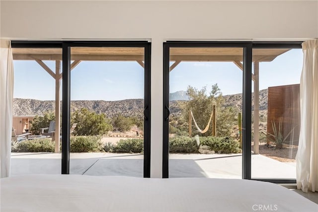 doorway featuring a mountain view