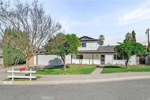 traditional-style home featuring a shingled roof, an attached garage, stucco siding, a front yard, and concrete driveway