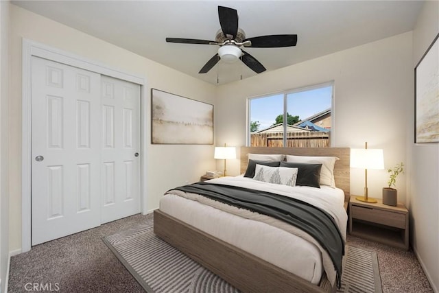 carpeted bedroom featuring baseboards, a ceiling fan, and a closet