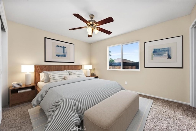 bedroom featuring baseboards, carpet, and a ceiling fan