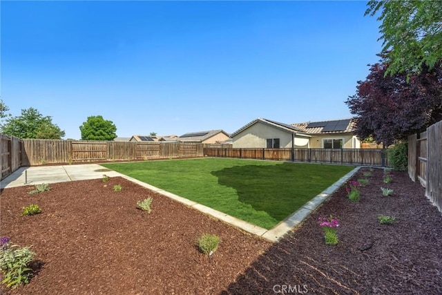 view of yard featuring a fenced backyard and a patio area