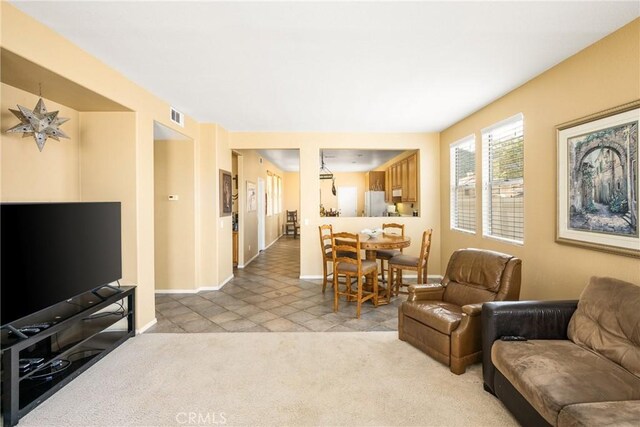 833 W Orange Heights Ln, Corona, CA 92882 - living area featuring baseboards and light carpet