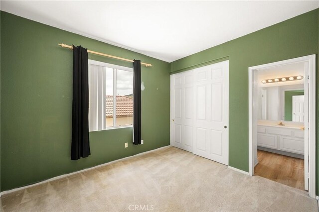 833 W Orange Heights Ln, Corona, CA 92882 - unfurnished bedroom with carpet floors, a closet, and baseboards