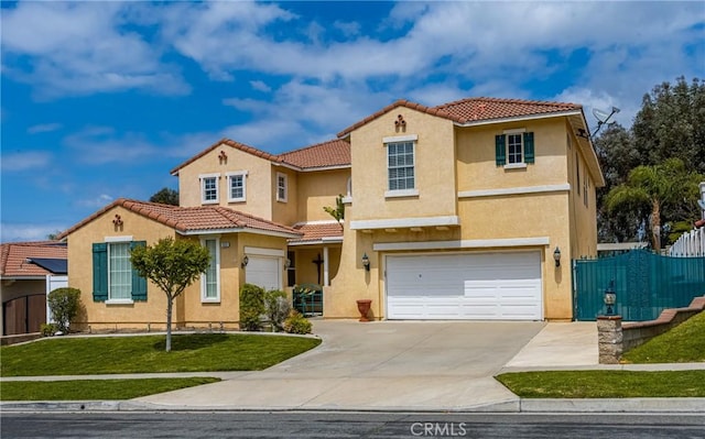 833 W Orange Heights Ln, Corona, CA 92882 - mediterranean / spanish-style house featuring a tile roof, stucco siding, a garage, and concrete driveway