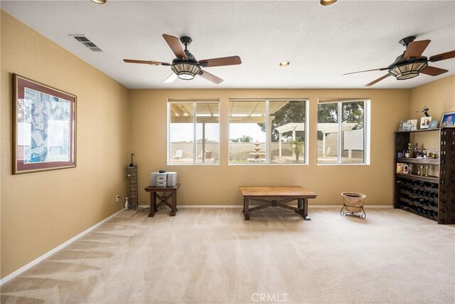 833 W Orange Heights Ln, Corona, CA 92882 - sitting room featuring a ceiling fan, carpet floors, baseboards, and recessed lighting
