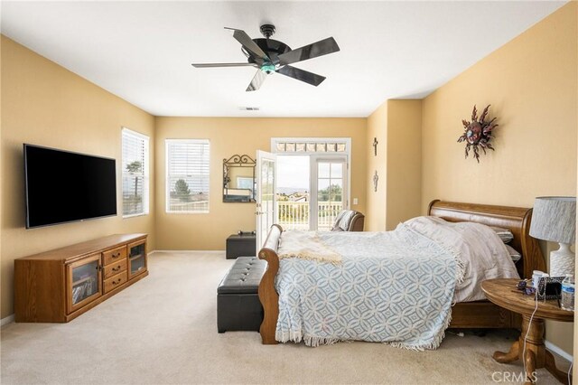 833 W Orange Heights Ln, Corona, CA 92882 - carpeted bedroom featuring access to outside, a ceiling fan, and baseboards