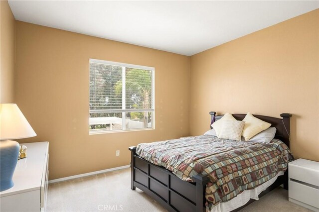 833 W Orange Heights Ln, Corona, CA 92882 - carpeted bedroom with baseboards
