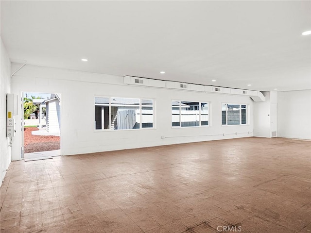 empty room with recessed lighting