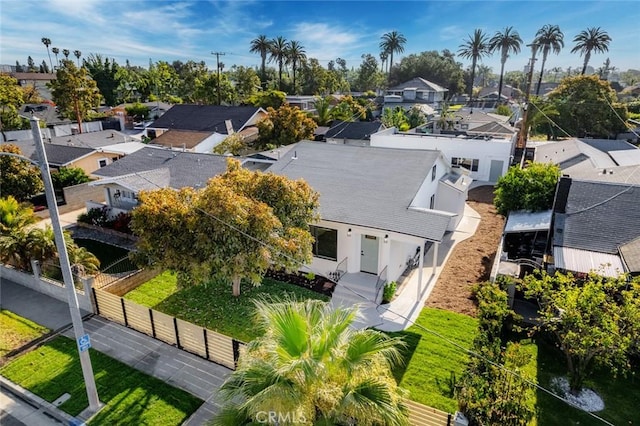 birds eye view of property with a residential view