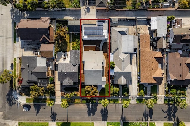 birds eye view of property with a residential view