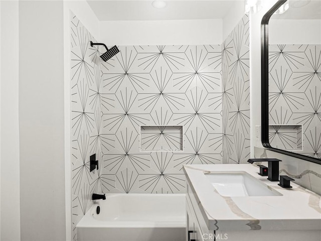 bathroom featuring vanity, recessed lighting, and shower / bathing tub combination
