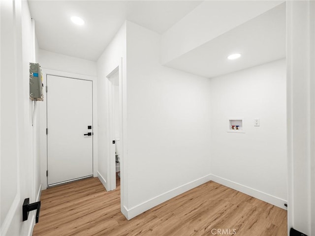 laundry room featuring baseboards, hookup for a washing machine, light wood finished floors, and recessed lighting
