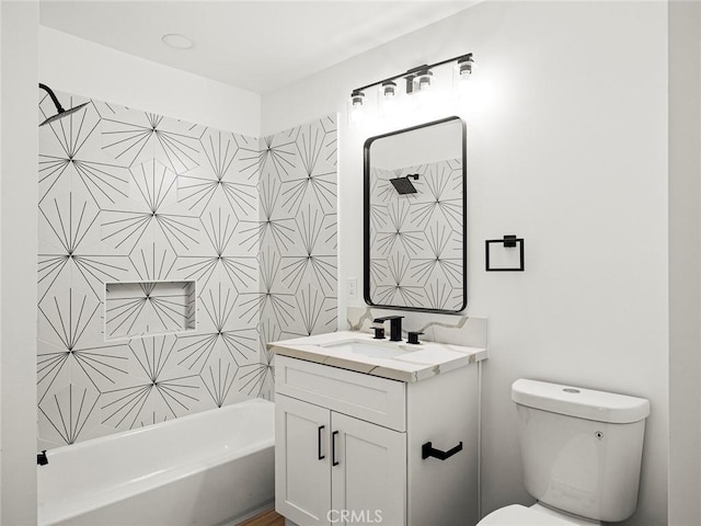 full bathroom featuring vanity and toilet