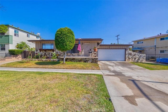 single story home with board and batten siding, driveway, fence, a garage, and a front yard
