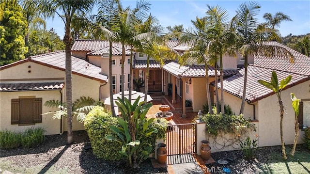 1925 Katie Ct, Fallbrook, CA 92028 - mediterranean / spanish home featuring stucco siding, a gate, a tiled roof, and fence