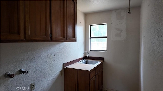 laundry room featuring a sink