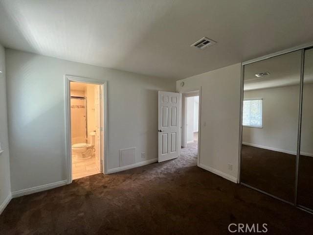 14675 Red Hill Ave, Tustin, CA 92780 - unfurnished bedroom featuring a closet, baseboards, carpet flooring, and visible vents