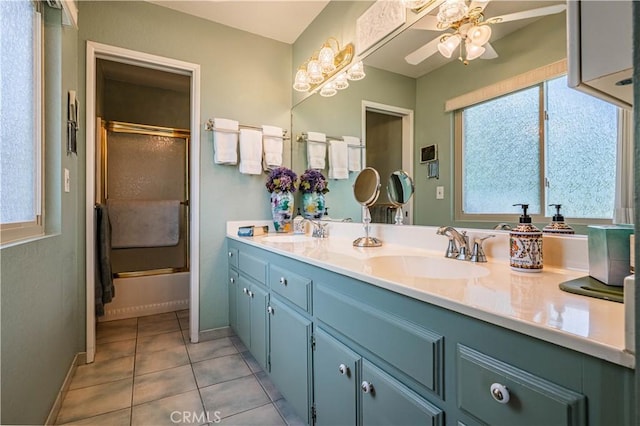 bathroom featuring a sink, tile patterned flooring, ceiling fan, and double vanity