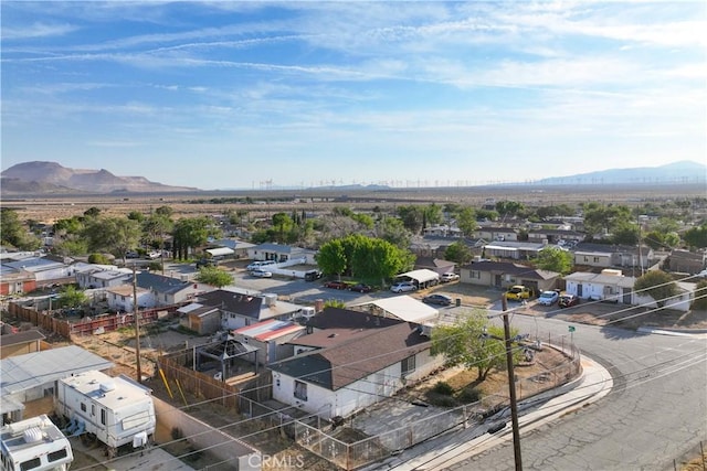 aerial view with a mountain view and a residential view
