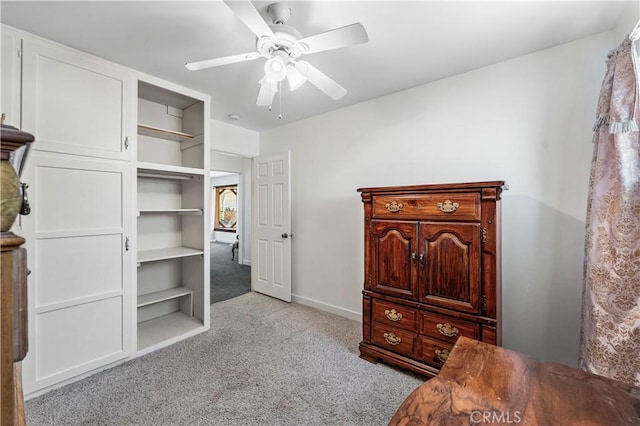 bedroom with carpet floors, baseboards, and ceiling fan