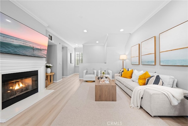 15212 Cambridge St, Tustin, CA 92782 - living area featuring visible vents, ornamental molding, wood finished floors, and a glass covered fireplace