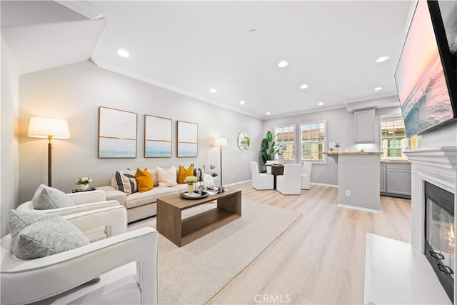 15212 Cambridge St, Tustin, CA 92782 - living area featuring crown molding, recessed lighting, baseboards, and light wood-style floors
