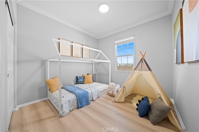 15212 Cambridge St, Tustin, CA 92782 - bedroom with crown molding, baseboards, and wood finished floors