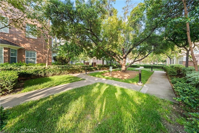 15212 Cambridge St, Tustin, CA 92782 - view of property's community with a lawn