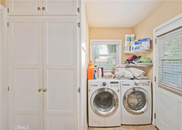 15709 Devonshire St, Granada Hills, CA 91344 - clothes washing area featuring separate washer and dryer