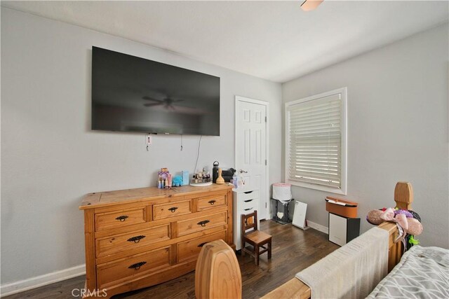 15709 Devonshire St, Granada Hills, CA 91344 - bedroom with dark wood-style flooring and baseboards