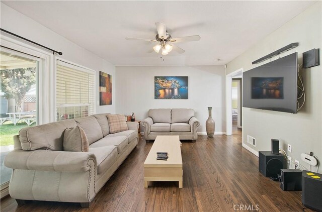 15709 Devonshire St, Granada Hills, CA 91344 - living area featuring a ceiling fan, dark wood-style floors, and baseboards