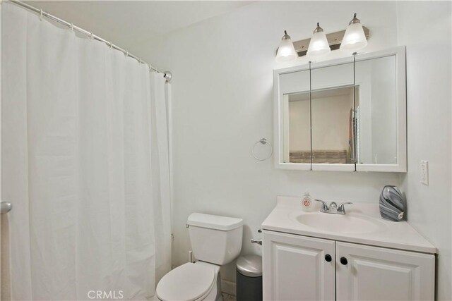 15709 Devonshire St, Granada Hills, CA 91344 - full bathroom featuring toilet, vanity, and a shower with curtain