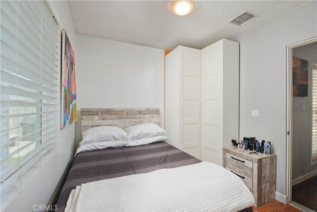 15709 Devonshire St, Granada Hills, CA 91344 - bedroom with wood finished floors