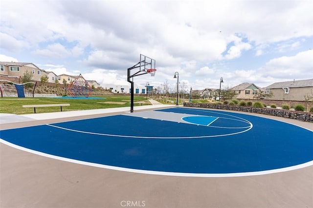 5597 Royal Oaks Way, Fontana, CA 92336 - view of sport court featuring community basketball court and a residential view