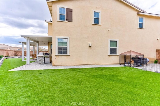 5597 Royal Oaks Way, Fontana, CA 92336 - rear view of property with a patio area, stucco siding, and area for grilling