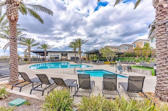 5597 Royal Oaks Way, Fontana, CA 92336 - community pool with a patio area