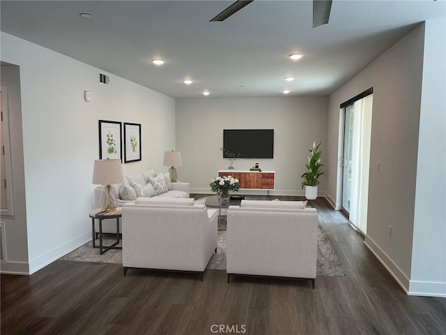living area featuring ceiling fan, dark wood finished floors, recessed lighting, baseboards, and visible vents