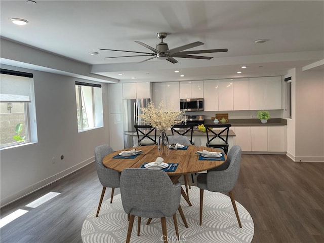 dining space featuring a ceiling fan, baseboards, recessed lighting, and dark wood-style floors