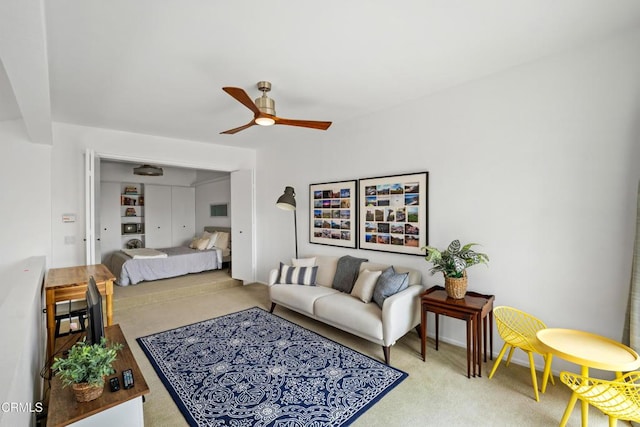 bedroom with ceiling fan and carpet flooring
