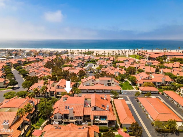 bird's eye view featuring a water view and a residential view