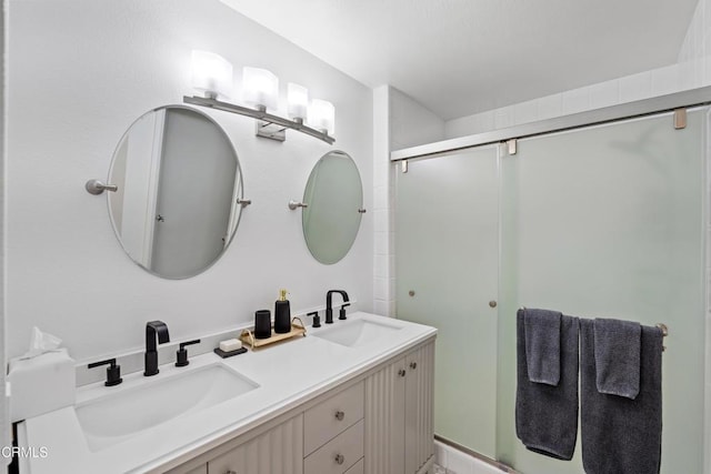 full bath featuring double vanity and a sink