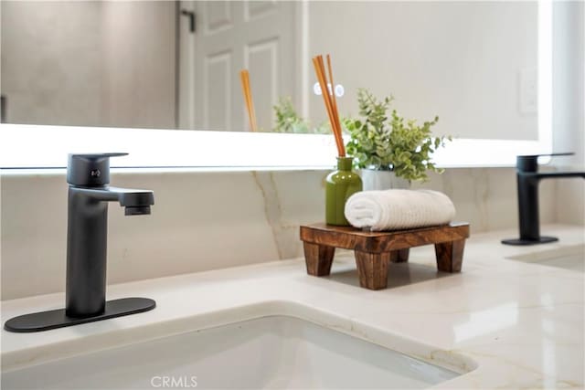 interior details featuring a sink