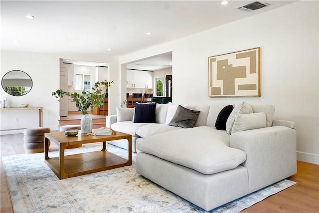 18324 Sylvan St, Tarzana, CA 91335 - living area featuring light wood-type flooring, recessed lighting, and baseboards