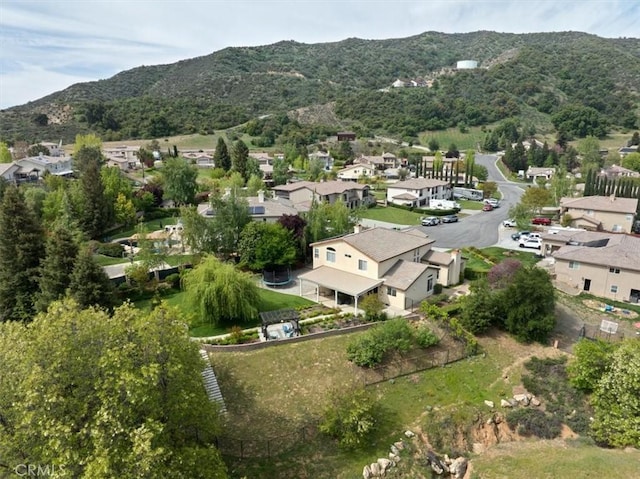 drone / aerial view featuring a mountain view and a residential view