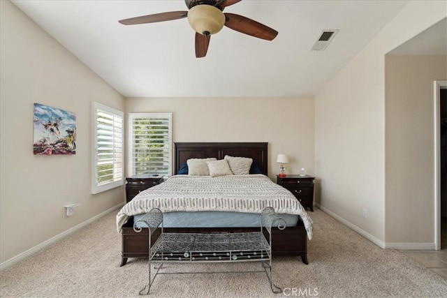 bedroom featuring carpet floors, baseboards, visible vents, and ceiling fan