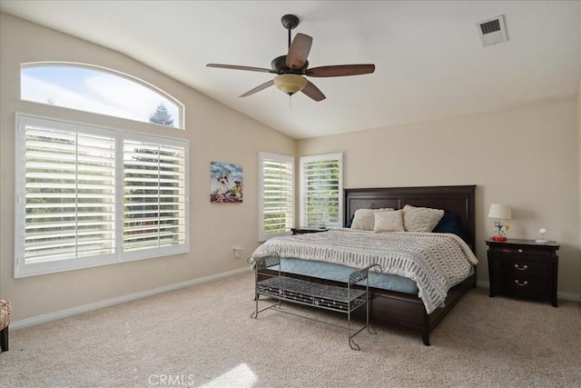 bedroom featuring ceiling fan, carpet floors, baseboards, lofted ceiling, and visible vents