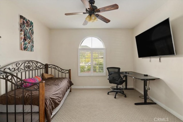 bedroom with baseboards, carpet, and a ceiling fan
