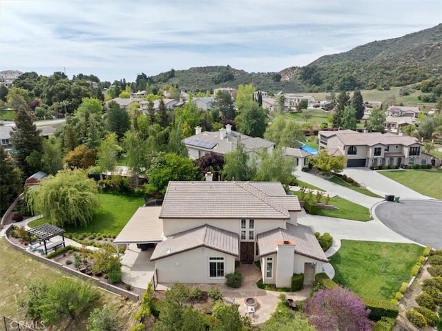 aerial view with a residential view and a mountain view