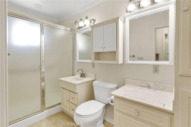 bathroom with vanity, ornamental molding, toilet, and a shower stall